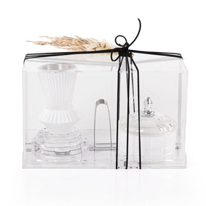 white decorated glass incense burner, bokhor storage box, and tong in an Acrylic box