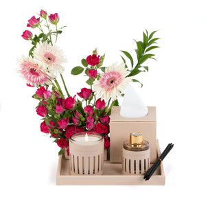 Beige Leather tray with matching tissue box, pink roses, candle, and diffuser