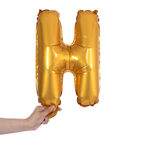 gold party balloon letter H