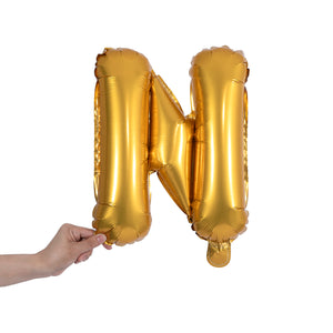 gold party balloon letter N