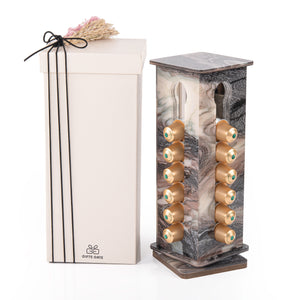 A purple Nespresso capsules stand