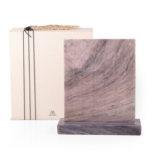 A purple Nespresso capsules stand