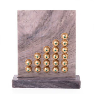 A purple Nespresso capsules stand