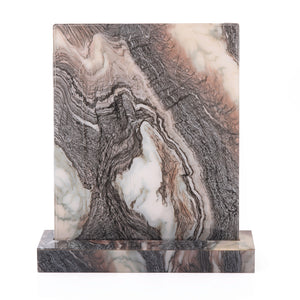 A marble Vertuo capsules stand