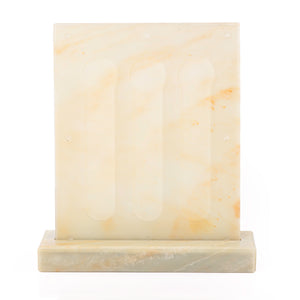 A yellow Vertuo capsules stand