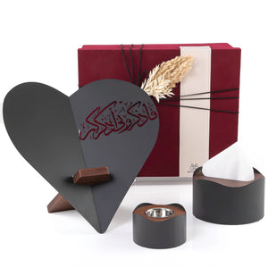 set of black Quran stand, tissue box, and incense burner