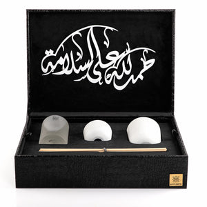 black box contains diffuser, sticks, and candle decorated with customized sentence or name