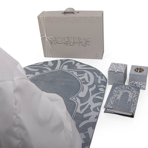 Blue set contains prayer carpet, matching prayer dress, Quran, incense burner, bakhor storage box with gift box