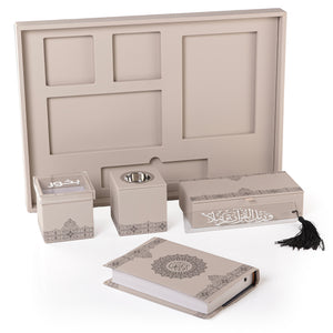 A beige set contains Quraan, incense burner, box, bakhor box, and bookmark