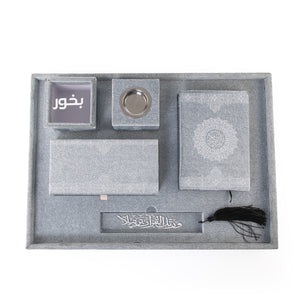 A grey set contains Quraan, incense burner, box, bakhor box, and bookmark