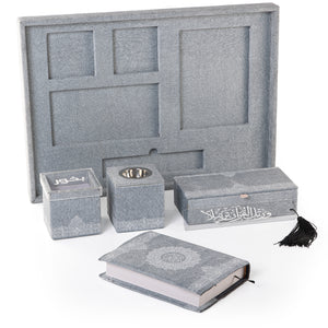 A grey set contains Quraan, incense burner, box, bakhor box, and bookmark