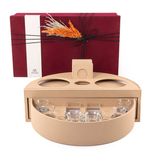 Beige leather set of circular stand contains six tea glasses, six coffee glasses, six coasters