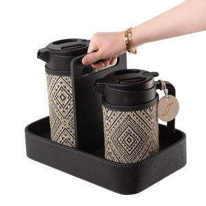 Set of two black thermoses with beige fabric covers and three labels "Tea, Karak, Coffee" on a handle stand