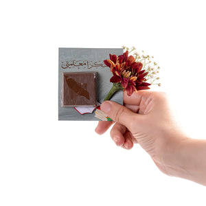 box of chocolate decorated with flower