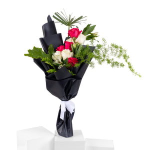 Elegant hand-tied bouquet featuring fresh deferent types of flowers -white ad red roses