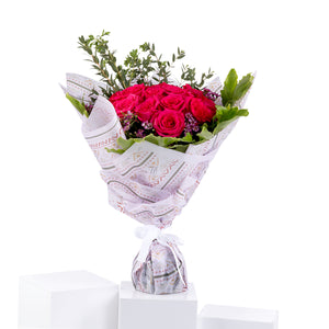 Elegant hand-tied bouquet featuring fresh deferent types of flowers