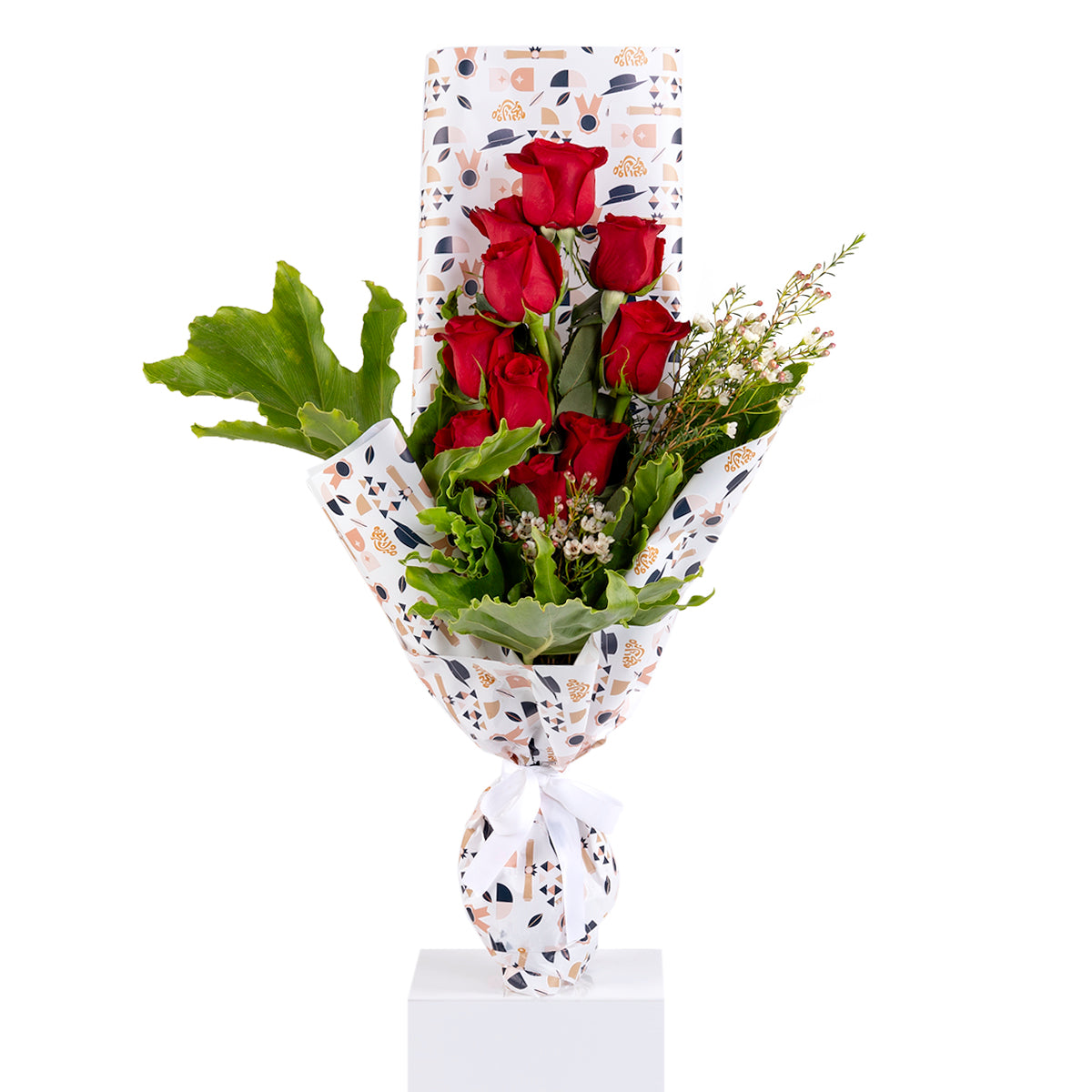 Elegant hand-tied bouquet featuring fresh red roses