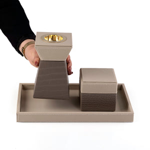 beige leather incense burner with a matching bakhour storage jar