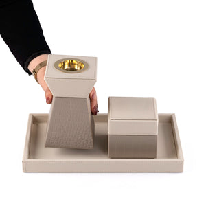 beige leather incense burner with a beige bakhor storage jar