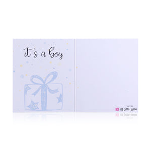White and blue new baby boy greeting card with the words 'It's a boy' written on it