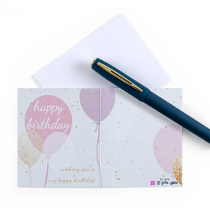 white greeting card with Happy Birthday sentence