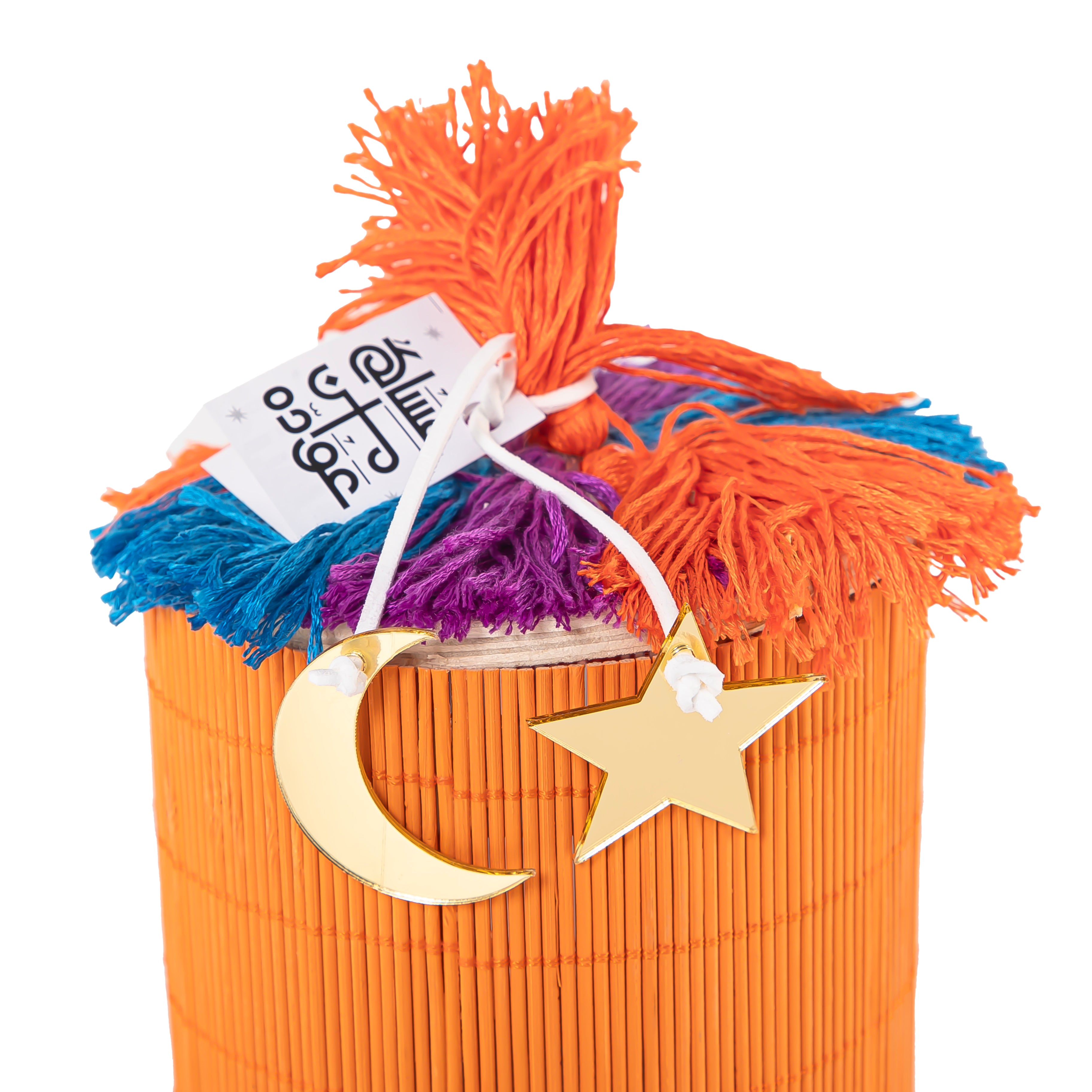 orange decorated wicker gergean box with a customized name label