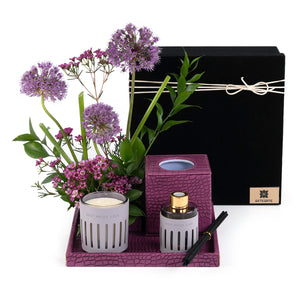 Purple Leather tray with matching tissue box, flower, candle, and diffuser