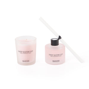 A diffuser, candle, and five sticks