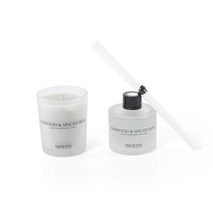 blue diffuser, candle, and five sticks