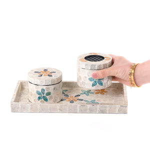 beige decorated MOP incense burner with a bowl in a tray