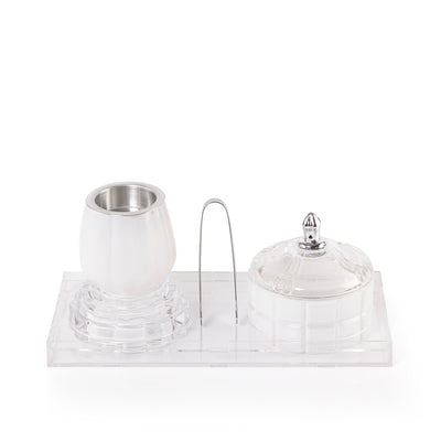 white decorated glass incense burner, bokhor storage box, and tong in an Acrylic box
