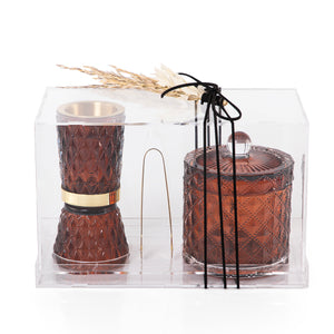 brown decorated glass incense burner, bokhor storage box, and tong in an Acrylic box
