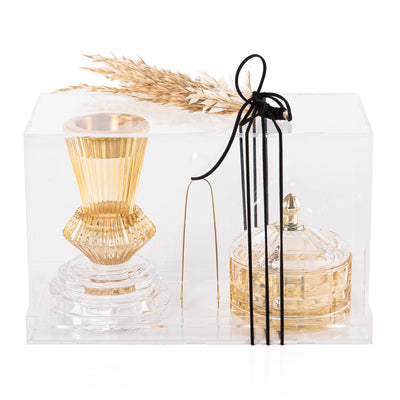 yellow decorated glass incense burner, bokhor storage box, and tong in an Acrylic box