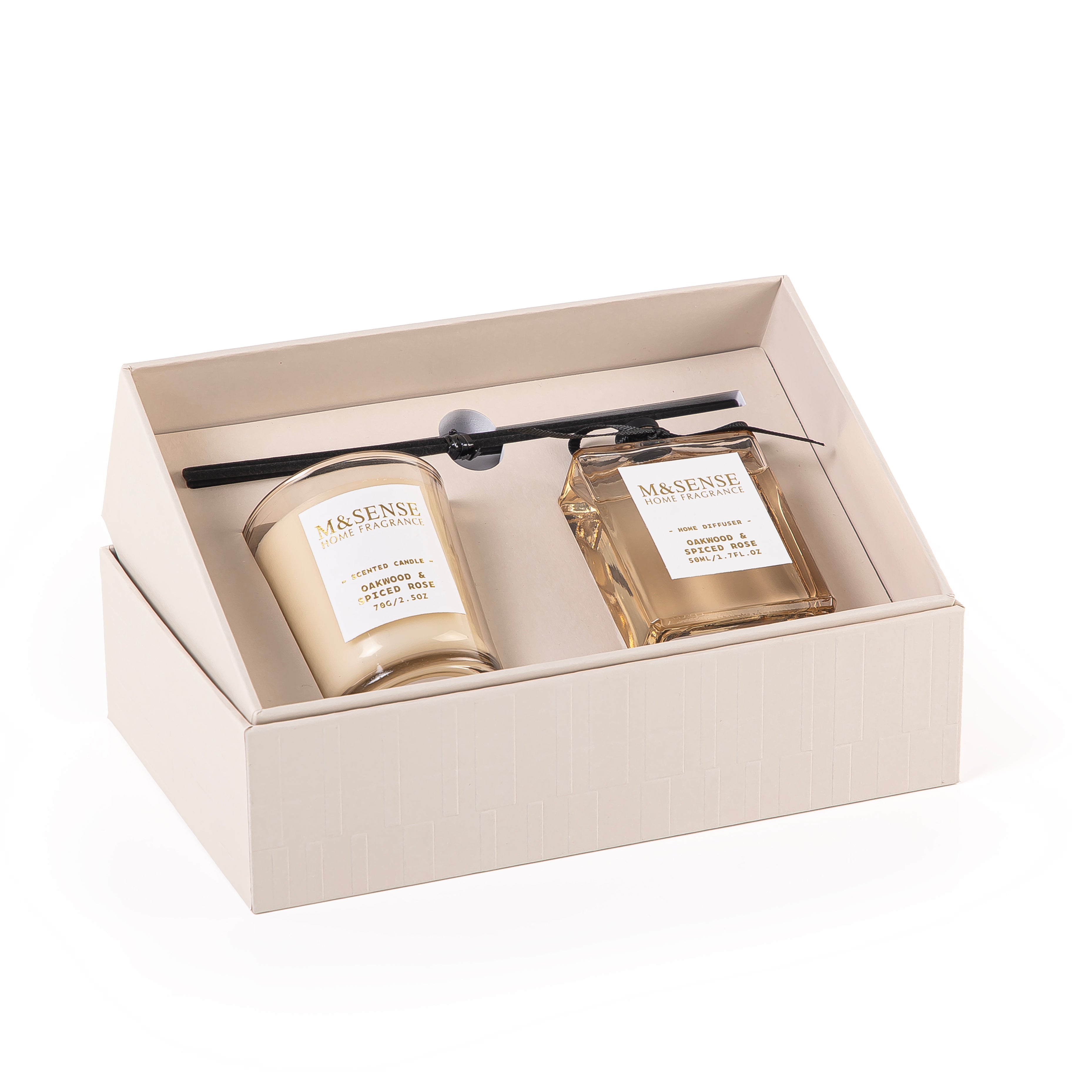 Rectangular decorated box with a customized name label, containing a diffuser, candle, and five sticks