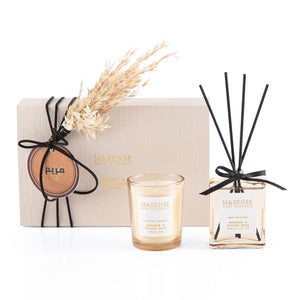 Rectangular decorated box with a customized name label, containing a diffuser, candle, and five sticks