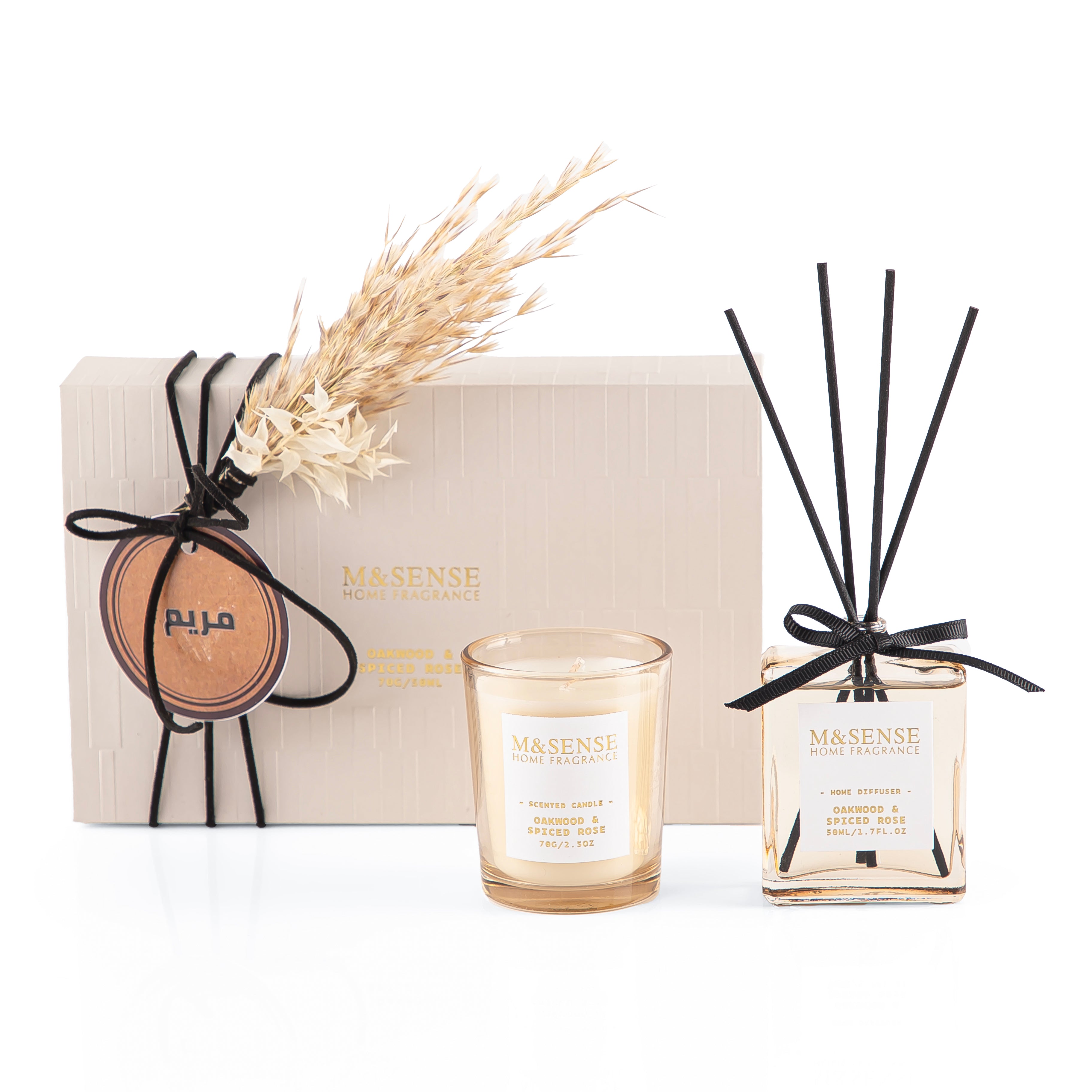 Rectangular decorated box with a customized name label, containing a diffuser, candle, and five sticks