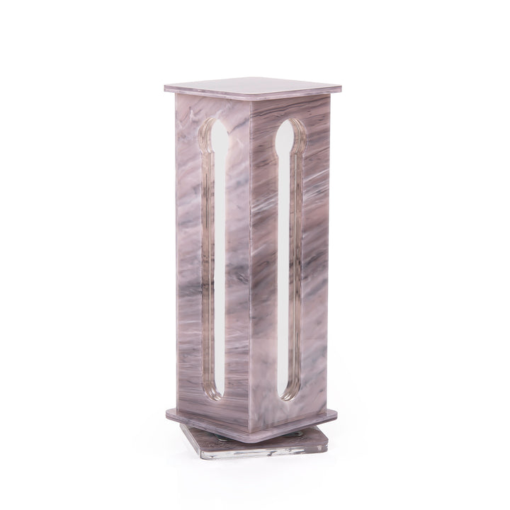 A purple Nespresso capsules stand