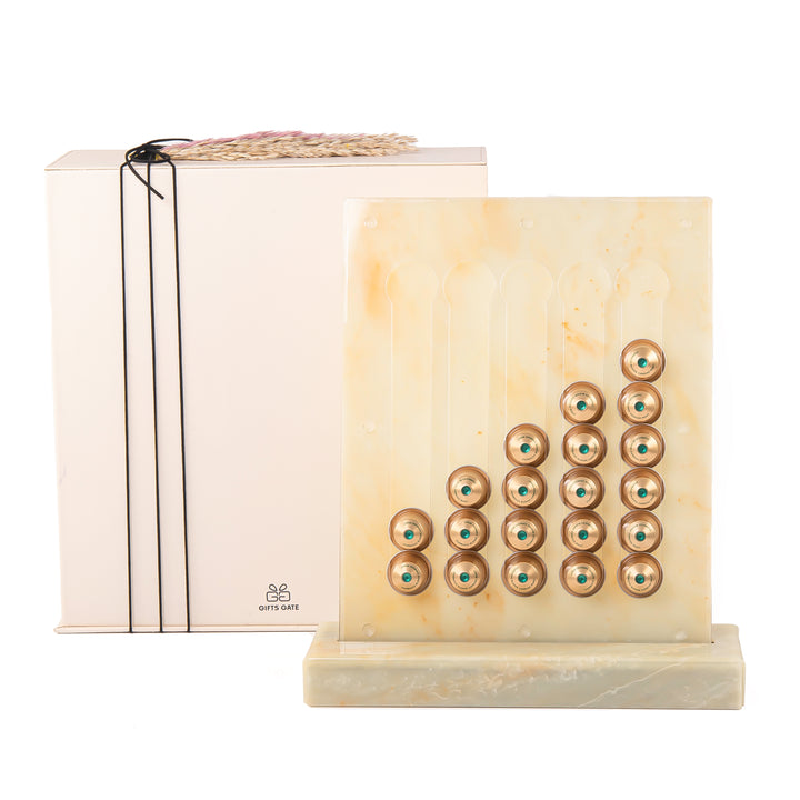A beige/yellow Nespresso capsules stand