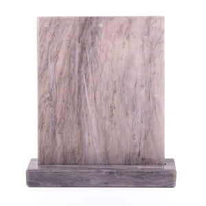 A purple Vertuo capsules stand