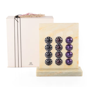 A yellow Vertuo capsules stand