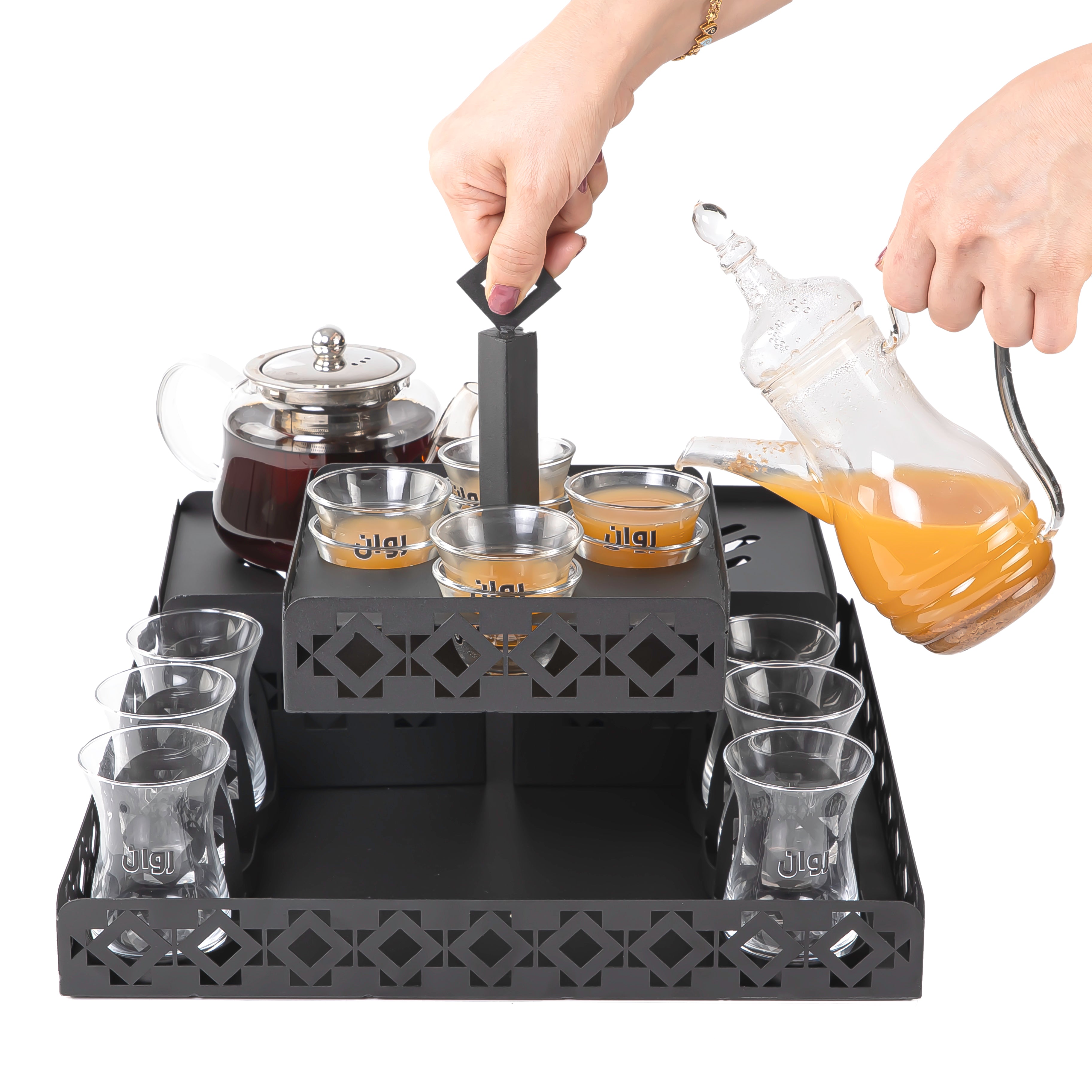 A black metal set contains tray, two stands, 8 coffee glasses, 6 tea glasses, and metal coasters
