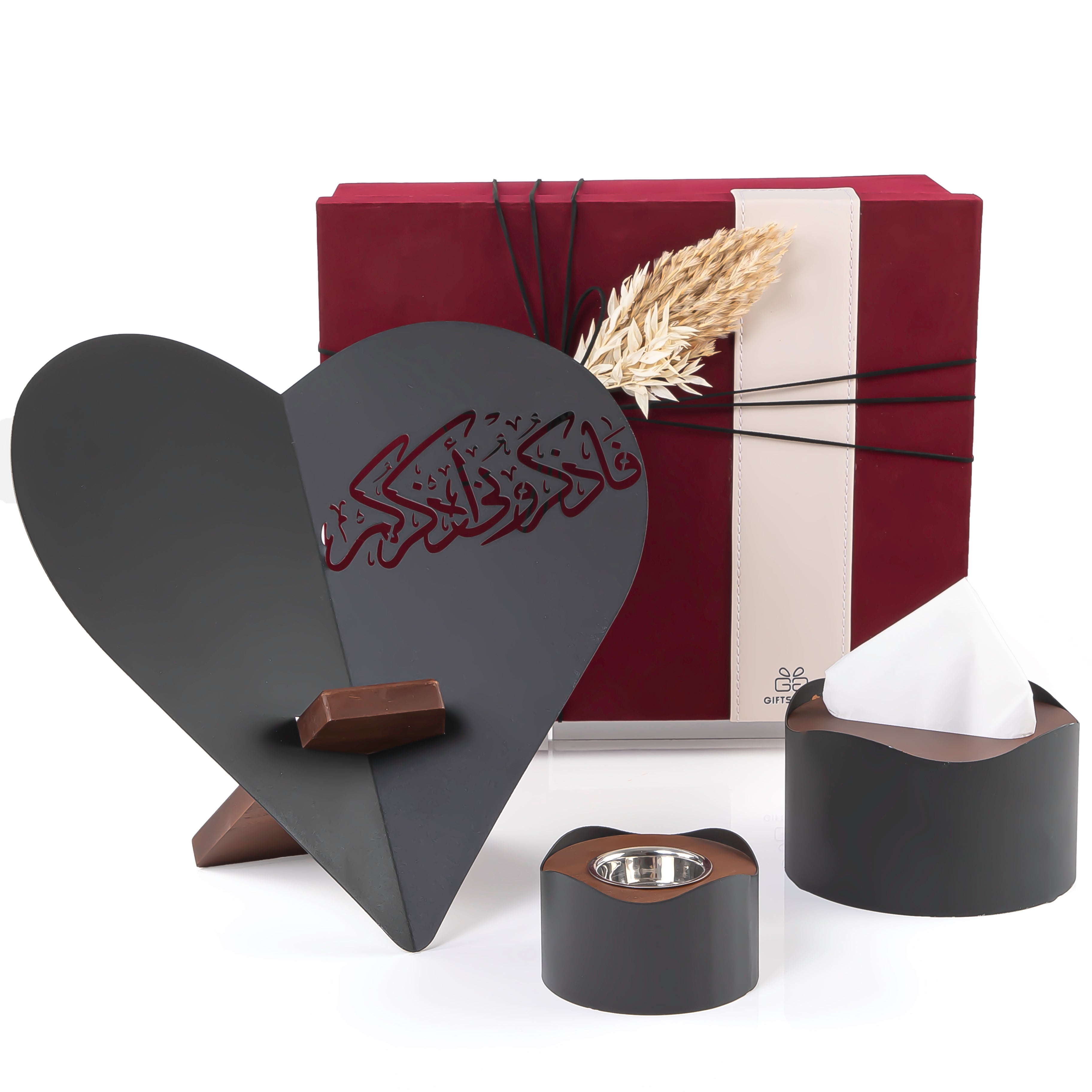 set of black Quran stand, tissue box, and incense burner