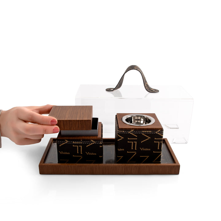 Brown tray with leather incense burner, and bakhor jar