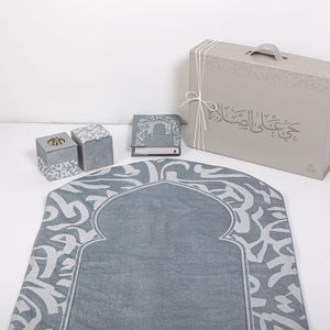 Blue set contains prayer carpet, matching prayer dress, Quran, incense burner, bakhor storage box with gift box