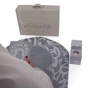 Blue set contains prayer carpet, matching prayer dress, Quran, incense burner, bakhor storage box with gift box