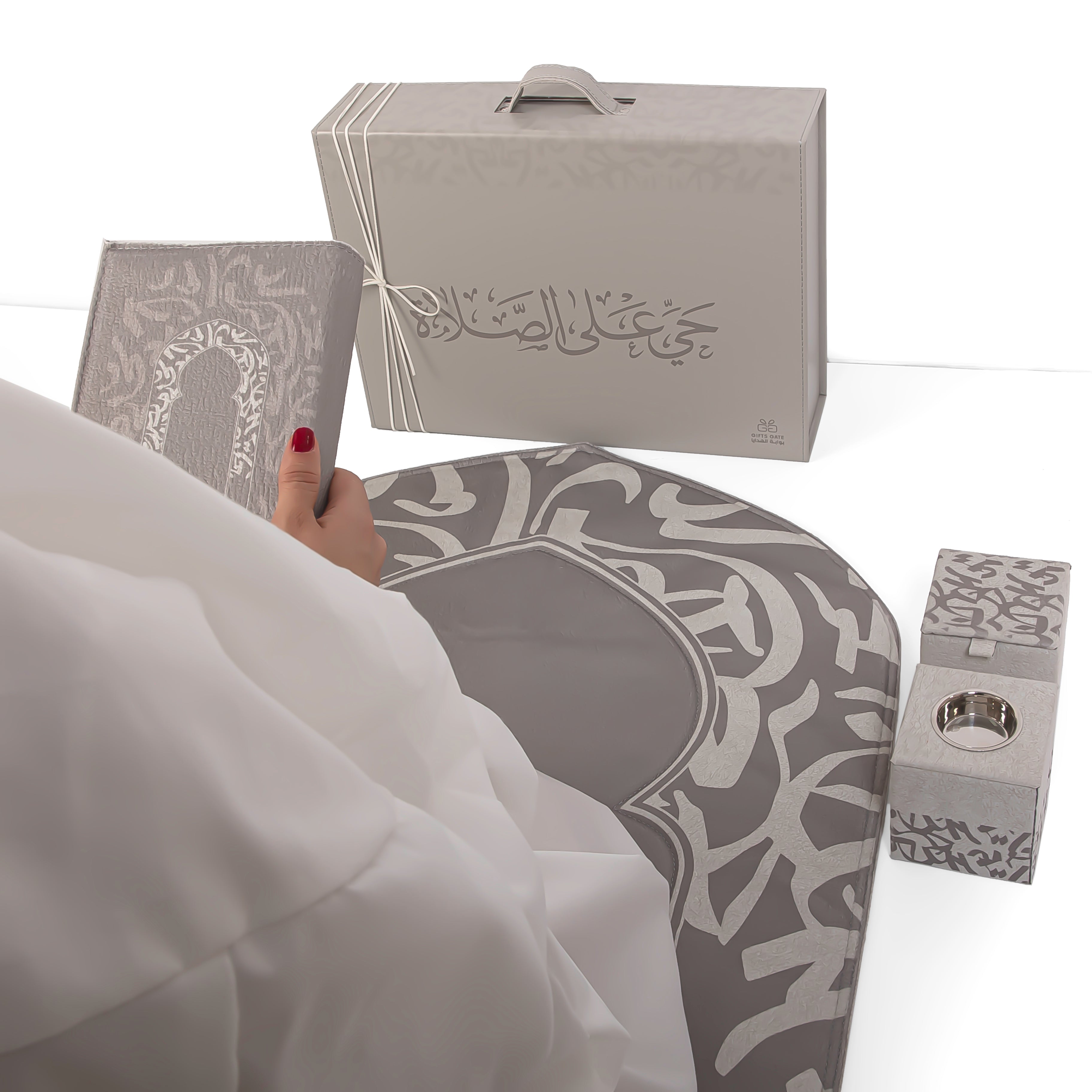 Grey set contains prayer carpet, matching prayer dress, Quran, incense burner, bakhor storage box with gift box