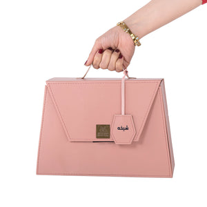 Pink bag contains three different room sprays with customizes name label 