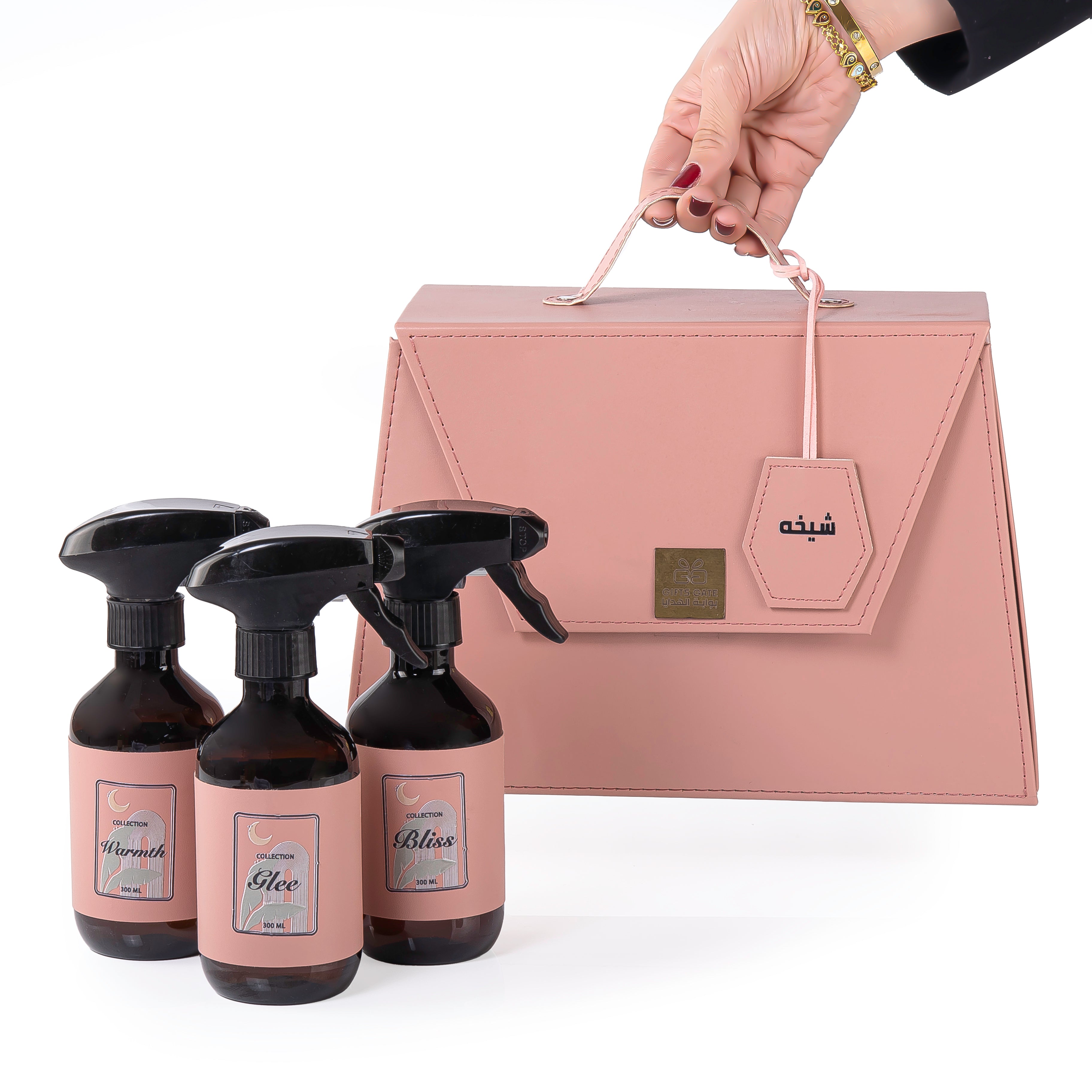 Pink bag contains three different room sprays with customizes name label 