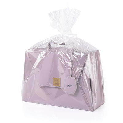 purple bag contains three different room sprays with customizes name label 
