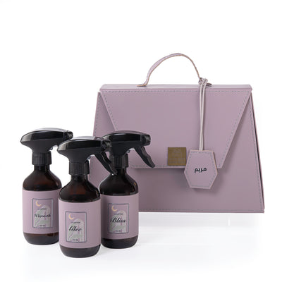 purple bag contains three different room sprays with customizes name label 